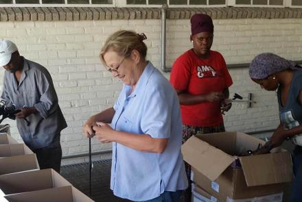 Job Creation Staff learning to sort hangers
